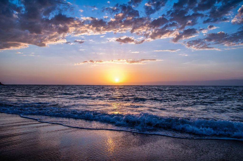 beach-clouds-dawn-635279.jpg